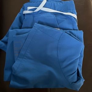 Gently used set of Figs scrubs